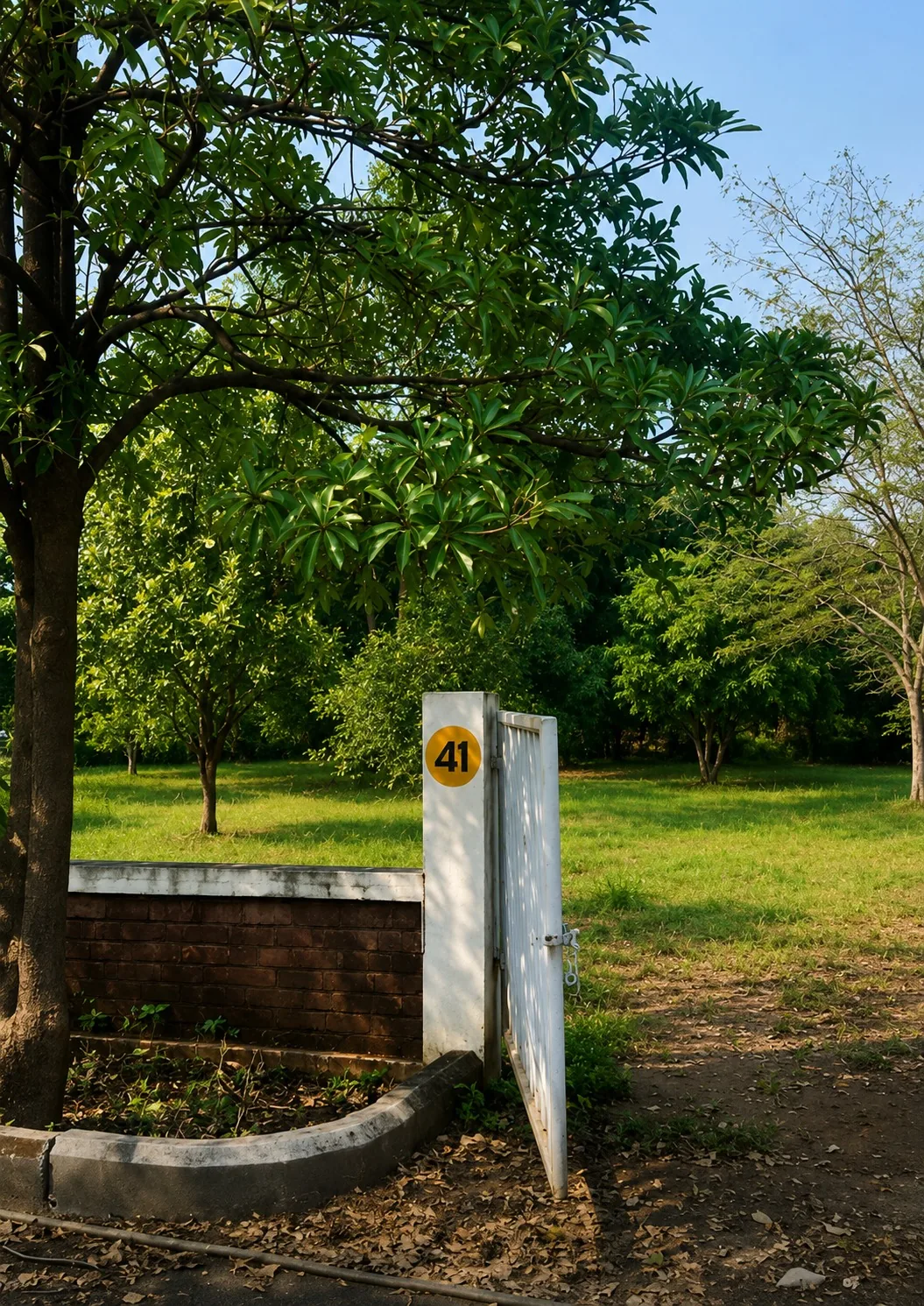 A numbered plot gate at Atgaon