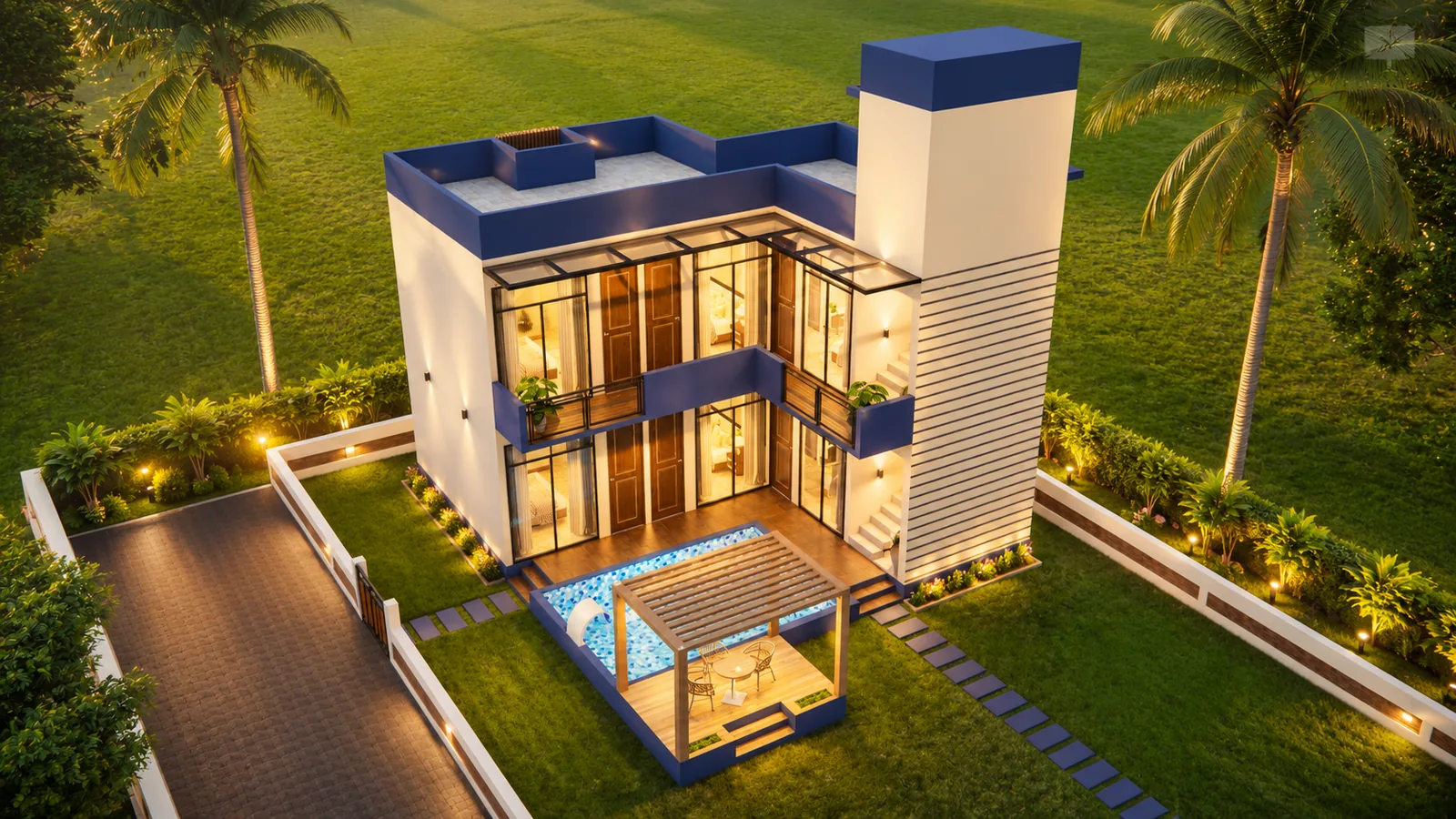A Kasara pool villa lit up at night